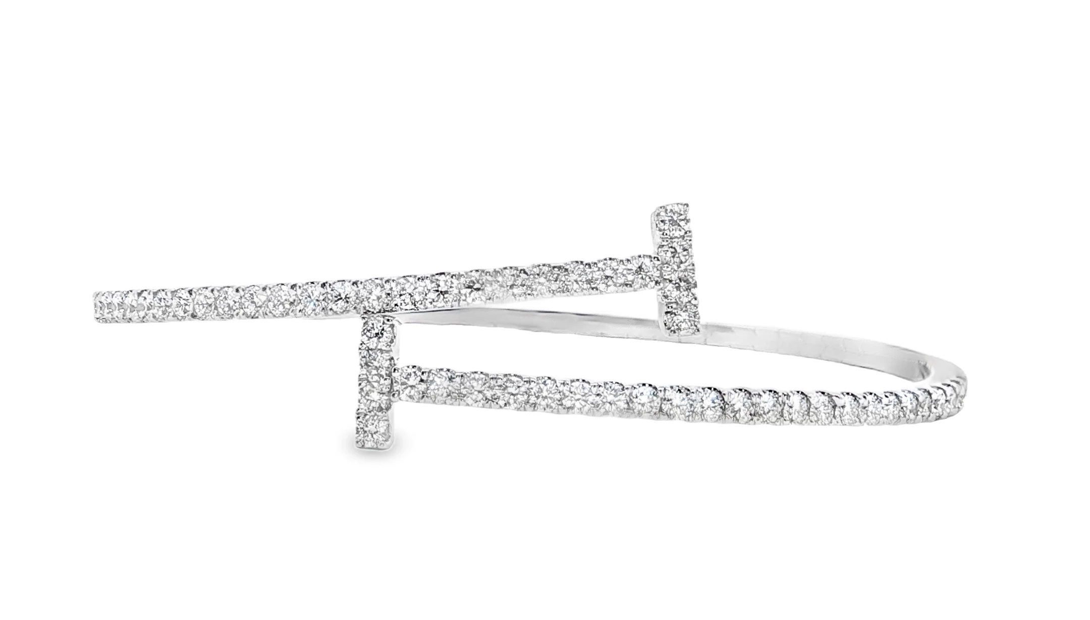 Elevate your style with this exquisite flexible bangle bracelet crafted from lustrous 14kt white gold-finish. Features a captivating design adorned with meticulously cut round brilliant diamonds, radiating unparalleled sparkle and sophistication. These bangles are a perfect fusion of modern artistry and timeless elegance. Diamond weight-2.00ct.