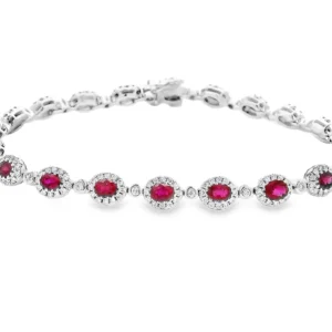 18kt White Gold Tennis Bracelet with Oval Cut Rubies. SKU DDI-345-10049