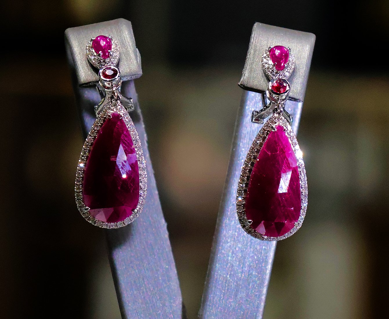 14 kt White Gold Dangle Earrings with Purple Ruby Cabochons. SKU DDI-590-10007