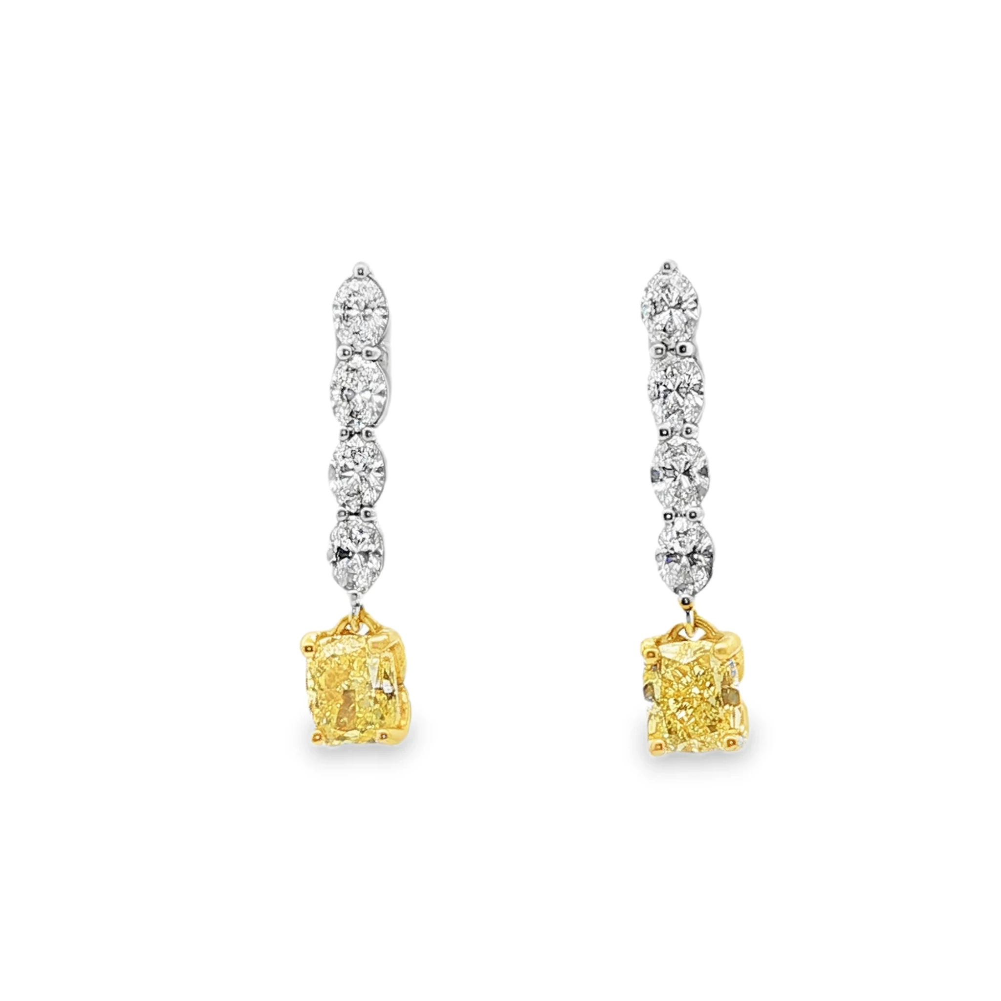 one of a kind matching Fancy Intense Yellow Cushion Cut Diamond Drop Earrings in 18K White Gold. SKU 3081