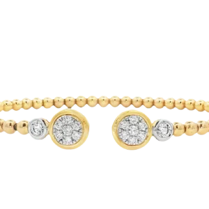 14k Yellow Gold Bangle with Round Brilliant Cut Diamond melees.   SKU  DDI-219704