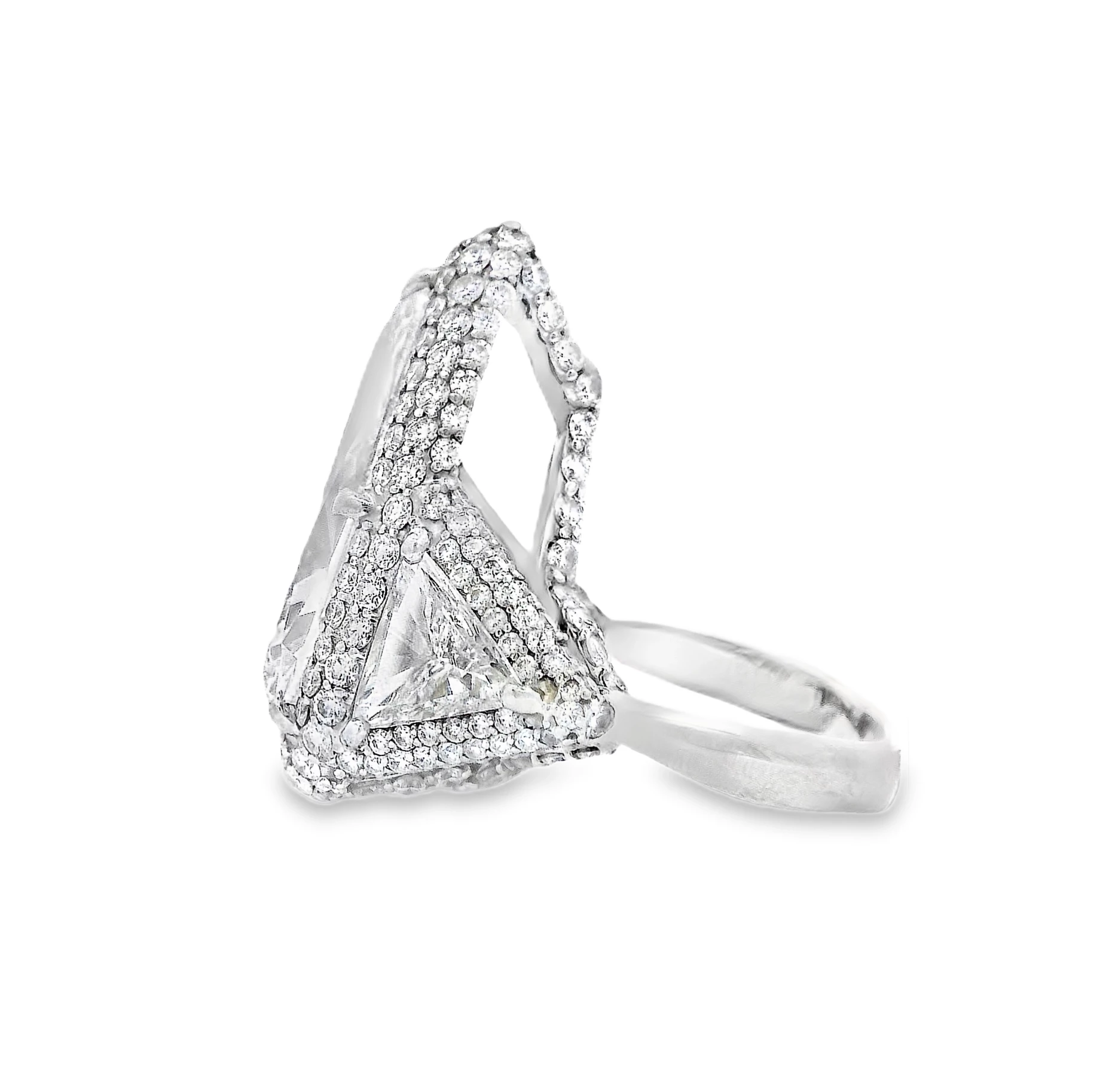 A custom made Platinum Cocktail Ring with Pear Cut diamond