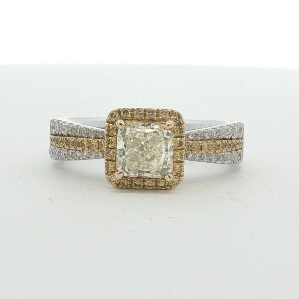 Fancy Light Yellow Diamond Halo Engagement Ring in White Gold