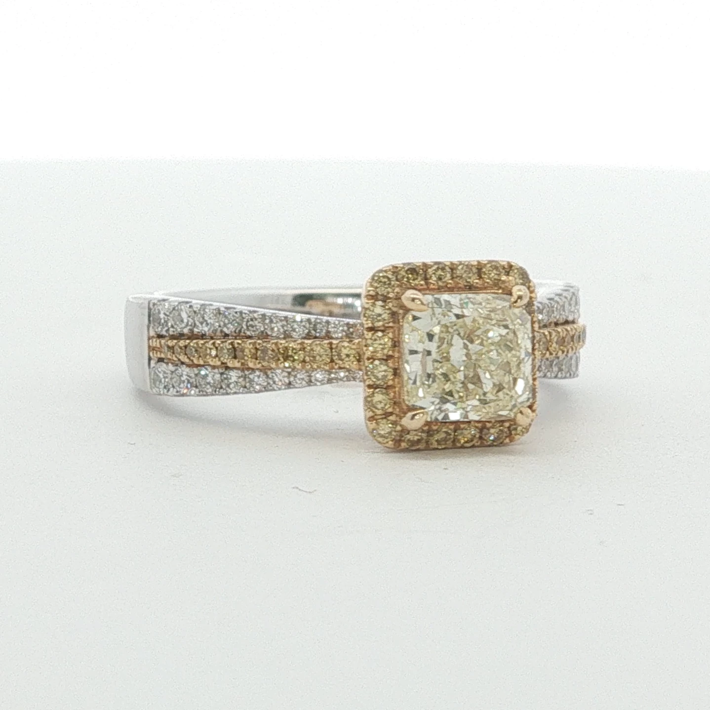 Fancy Light Yellow Diamond Halo Engagement Ring in White Gold