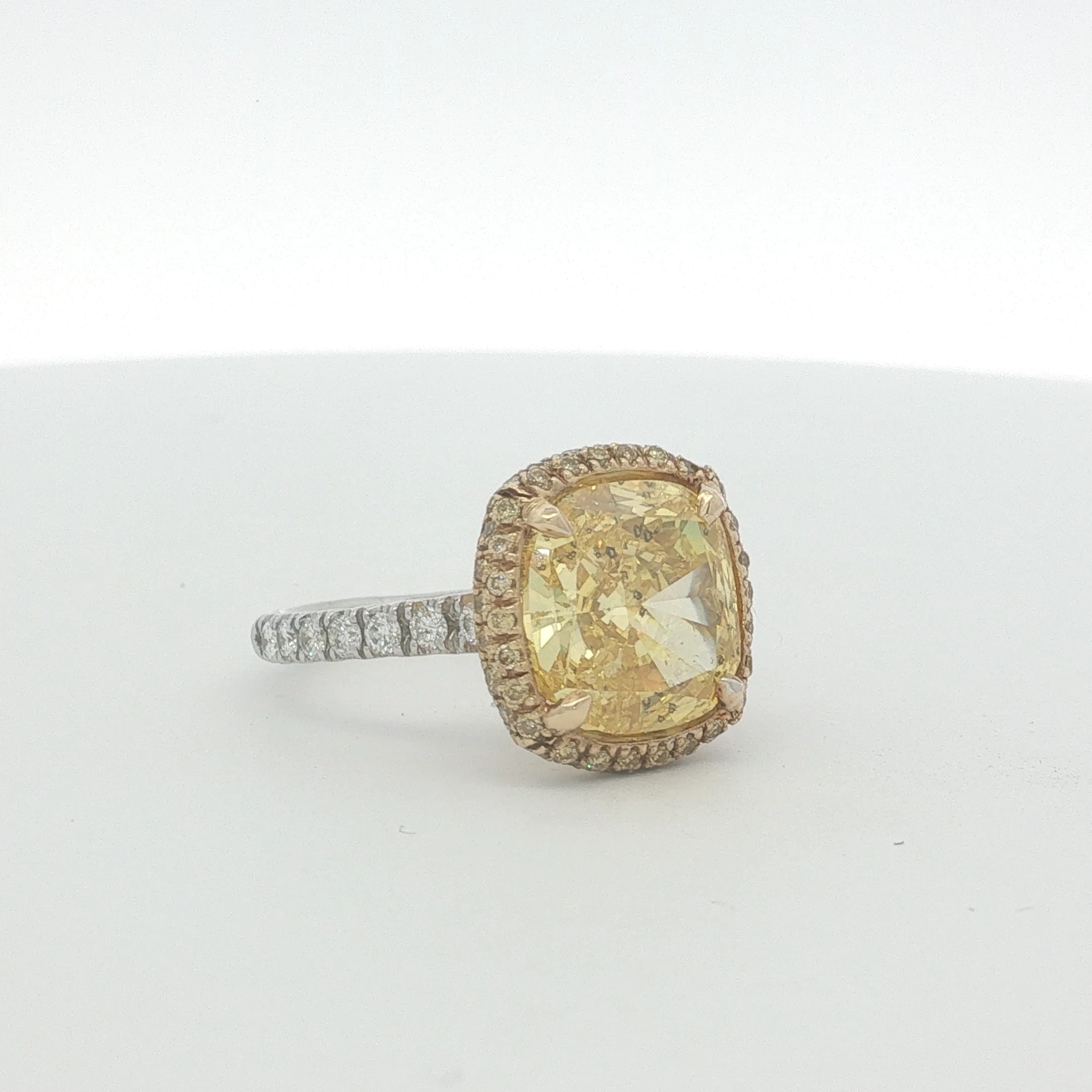 Fancy Vivid Yellow Diamond Halo Ring in White Gold