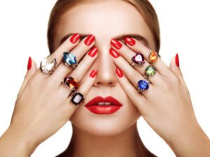 Woman wearing colorful gemstone rings